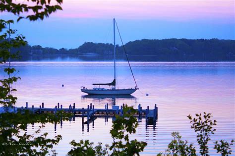 A beautiful sunset on White Lake in Whitehall, Michigan. © Ann Sinclair ...