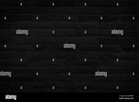 Old Black Brick Wall Texture For Background With Copy Space For Design