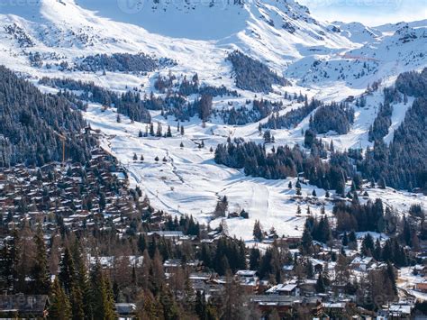 Aerial View of Snow Covered Verbier, Swiss Alps with Ski Trails and