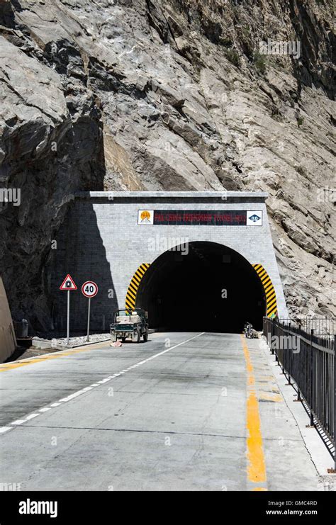 Jeep About To Enter The Chinese Built Tunnel By Attabad Lake Stock