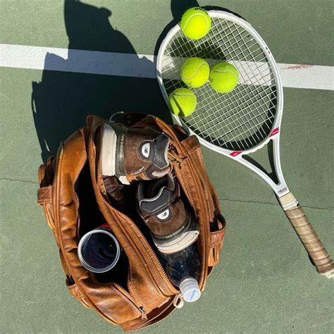 In Tennis Racket Sporty And Rich Rackets