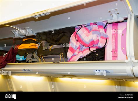 Overhead Locker Airplane Hi Res Stock Photography And Images Alamy