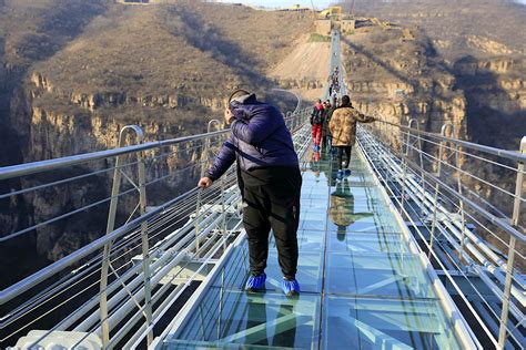 Defy gravity on China's new record-breaking glass bridge - Lonely Planet