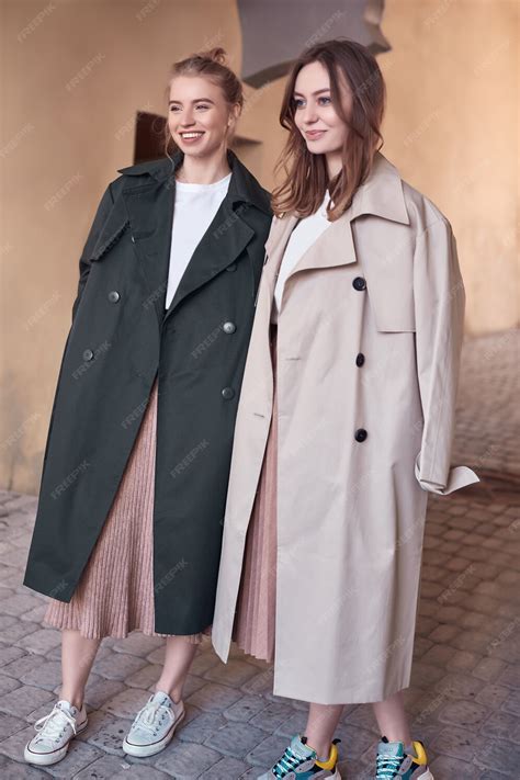 Free Photo Couple Beautiful Hipster Girls Wearing Long Fashion Coats On The Street