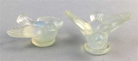 Lot 13 A Lot Of Two Sabino Opalescent Glass Figures