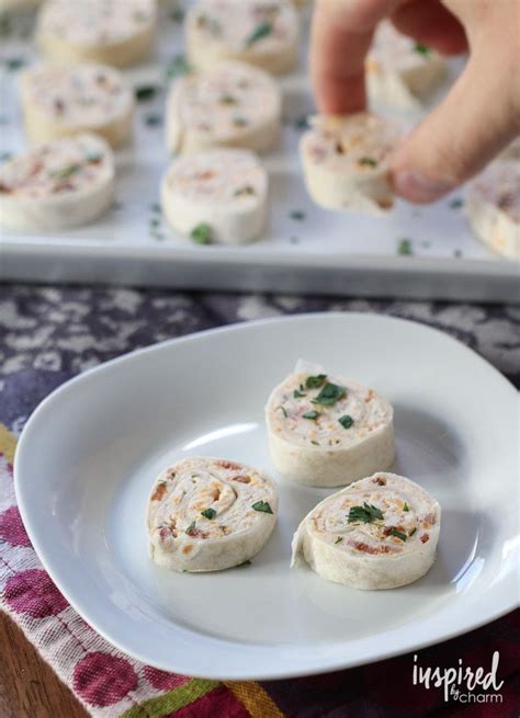 Small Appetizers On A White Plate Being Served