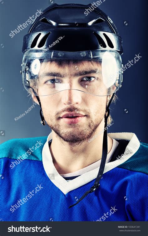 Portrait Of A Handsome Ice Hockey Player Studio Shot Stock Photo