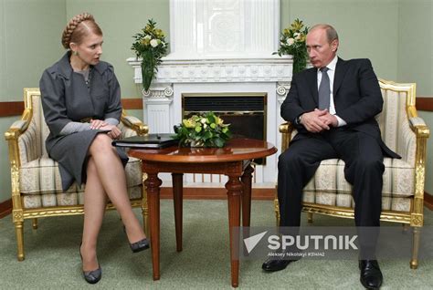 Prime Minister Vladimir Putin And Ukraines Prime Minister Yulia