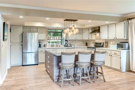 Transform Your Kitchen With Grey Wood Floors And Oak Cabinets The