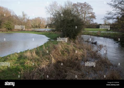 River Deben In Bankfull Stage With Levee On River Bank And Water On