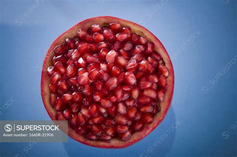 Half of a pomegranate. - SuperStock
