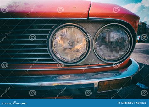 Close Up Of Headlight Of A Red Vintage Classic Car Editorial Photo