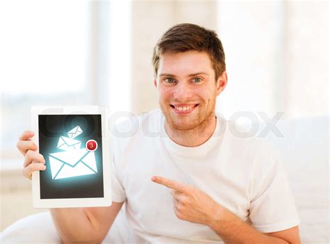 Education Communication And Internet Concept Man Holding Tablet Pc