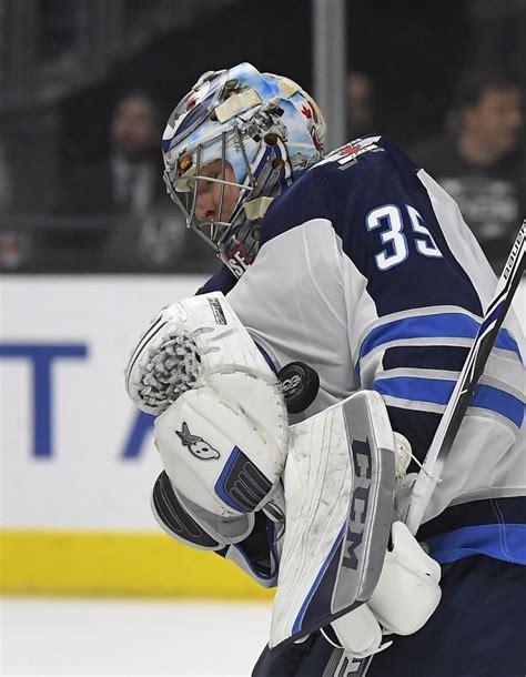 Winnipeg Jets Goalie Steve Mason Stops A Shot During The Second Period