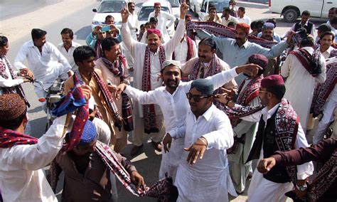 Sindh Brings Out Its Colours On Ajrak Topi Day Pakistan Dawncom