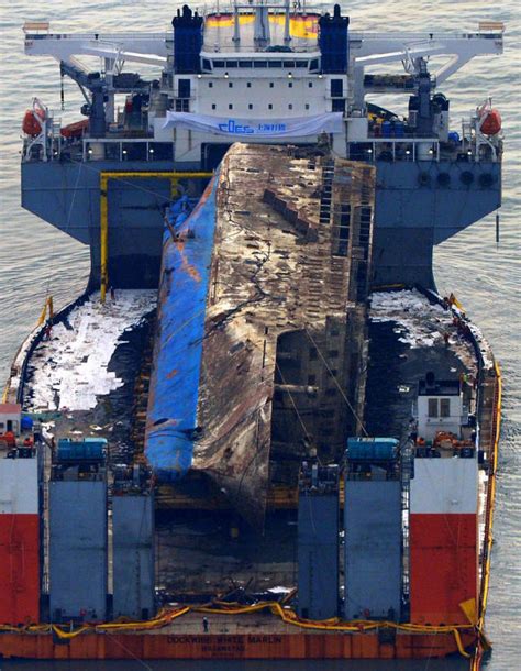 In pictures: Sewol ferry raised from the sea three years after disaster ...