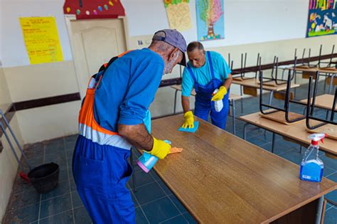 Two School Janitors Stock Photo - Download Image Now - Custodian ...