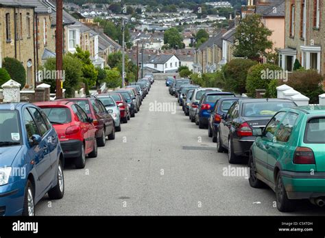 Cars Parked Both Sides Of Road High Resolution Stock Photography And