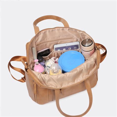 What To Pack In Your Nappy Bag The Nappy Bag Essentials Checklist
