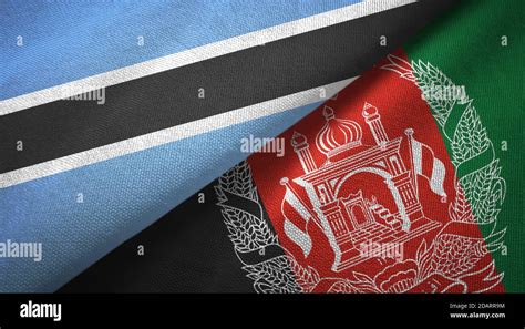 Botswana And Afghanistan Two Flags Textile Cloth Fabric Texture Stock