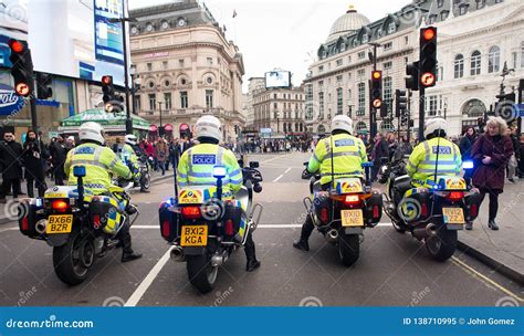 Metropolitan Police Motorcycle Riders Escort A Protest Demonstration In