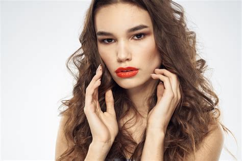Premium Photo Portrait Of A Brunette With Red Lipstick On Her Lips Beautiful Woman