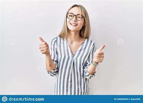 Asian Young Woman Wearing Casual Clothes And Glasses Success Sign Doing