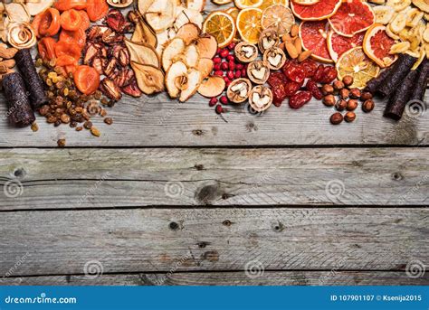 Different Dried Fruits On A Wooden Surface Stock Image Image Of