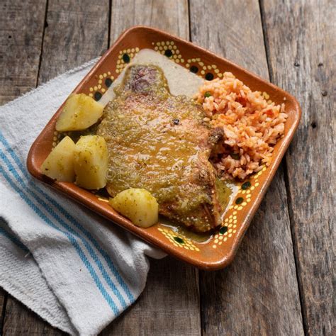 Mexican Smoked Pork Chops With Green Sauce And Rice Stock Image Image