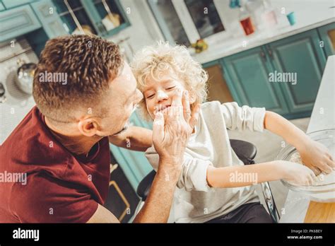 Curly Blonde Haired Boy Feeling Happy Spending Morning With Father