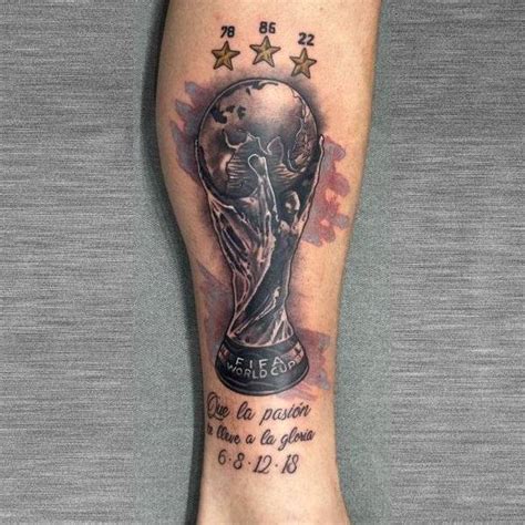 Wolrd Cup Trophy Tattoo Located On Emiliano Martinezs