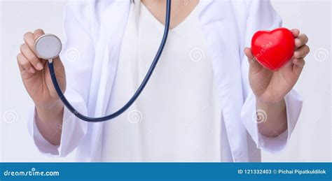 Doctor with Stethoscope Examining Red Heart Stock Image - Image of clinic, heart: 121332403