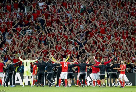 Wales Team Celebrate Historic Euro 2016 Victory Over Belgium By Leading