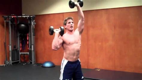 How To Squat Alternating Dumbbell Shoulder Press Youtube