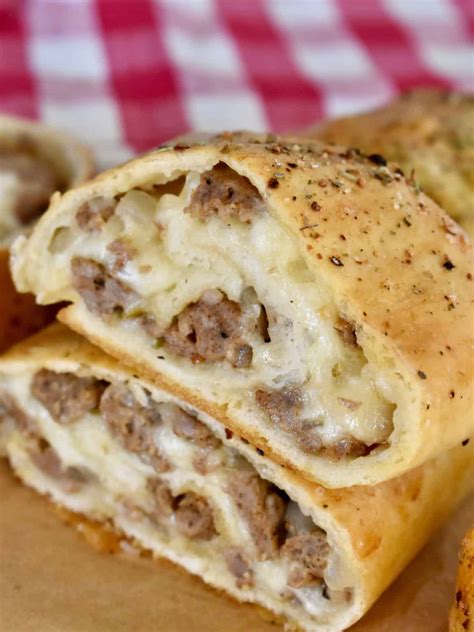 Italian Sausage Bread Stuffed With Sausage And Cheese This Delicious House