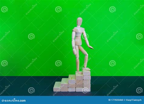 Wooden Man Walk Up The Career Stairs Ladder Made With Wooden Bricks