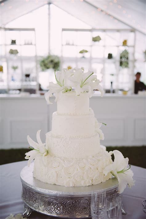 White Lily Adorned Wedding Cake