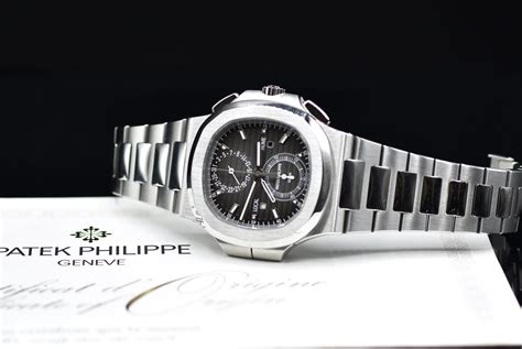 Patek Philippe Nautilus Travel Time Ref Full Set Romain R A