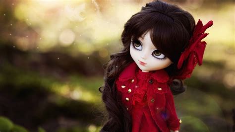 Download Pretty Doll In Red Coat Wallpaper | Wallpapers.com