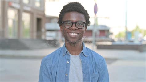 Portrait Of Agree African Man Shaking Head In Approval Outdoor Stock