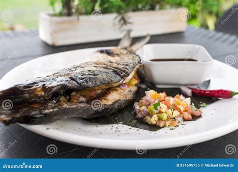 Grilled Boneless Bangus Stuffed With Vegetables And Served With