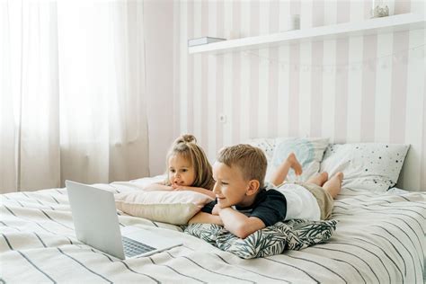 Kids Lying on the Bed · Free Stock Photo