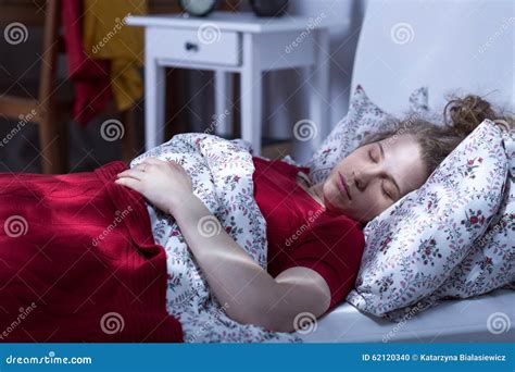 Lonely Woman Sleeping In Bed Stock Photo - Image: 62120340