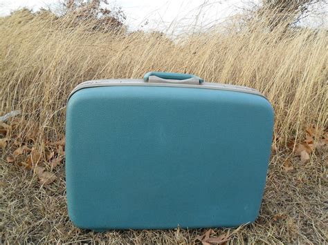 Elegantly Understated: A fun vintage blue suitcase