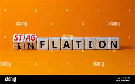 Stagflation Or Inflation Symbol Turned Wooden Cubes And Changed The