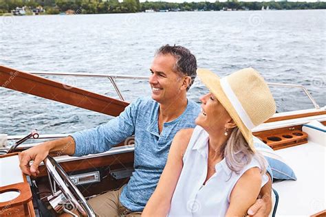 Life Is One Luxurious Boat Ride A Mature Couple Enjoying A Relaxing