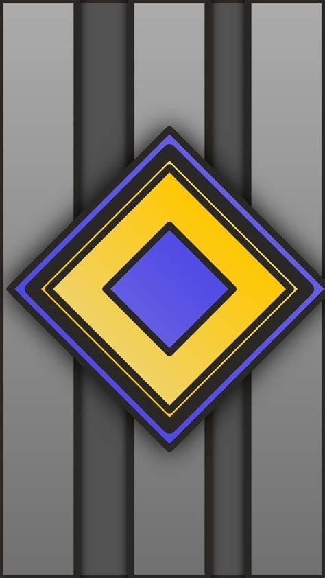 An Image Of A Blue And Yellow Diamond On A Gray Background With