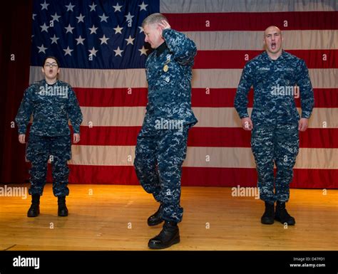 MCPON Rick D. West calls for a "Hooyah!" from the audience Stock Photo ...