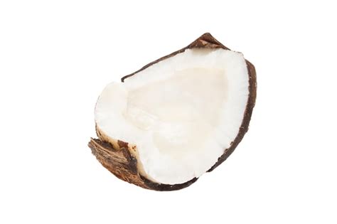 Premium Psd Piece Part Of A Coconut In A Coconut Shell On A White