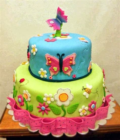 Torta de cumple multicolor decorada con flores y mariposas ツ Imagenes